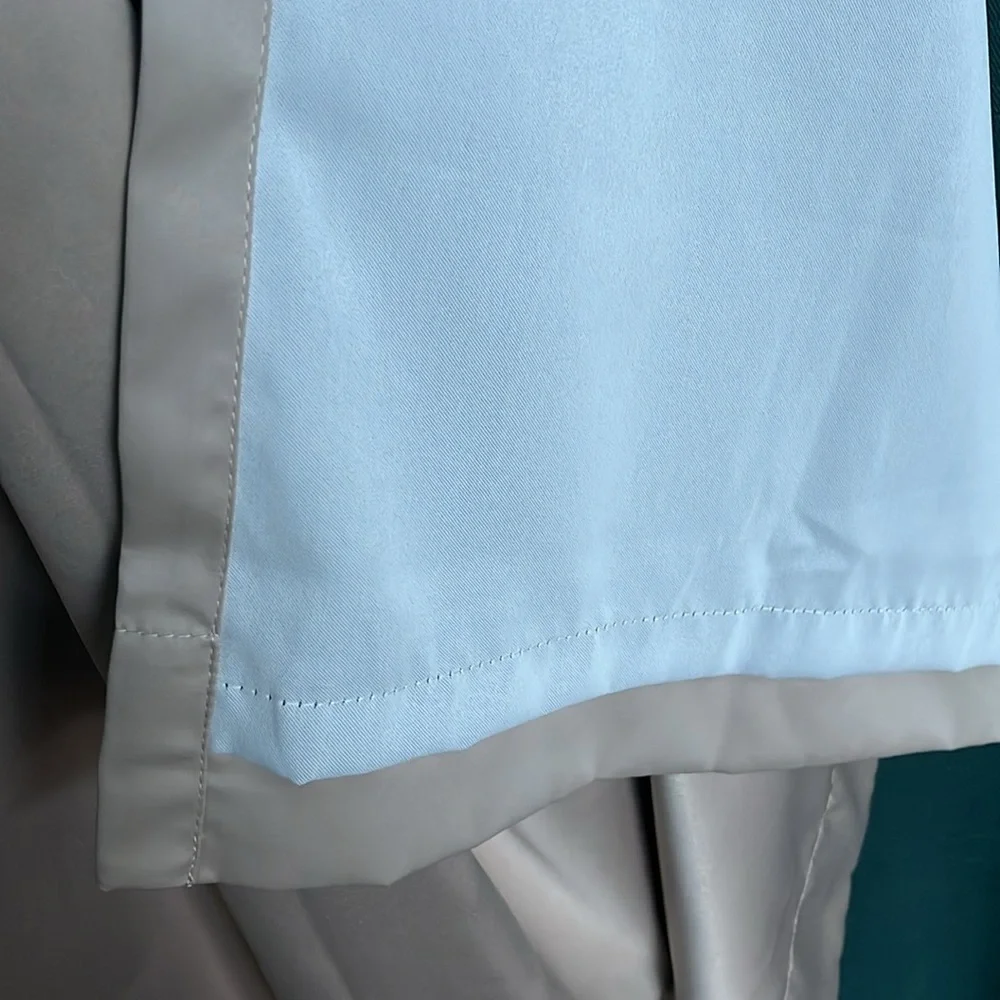 Liz Claiborne pair of Tan Curtains with Metal Grommets